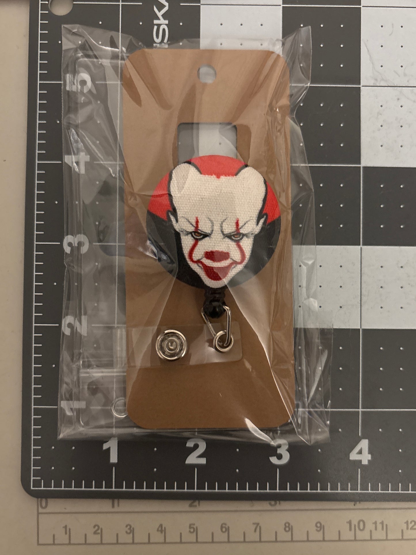 Pennywise Fabric Badge Reel