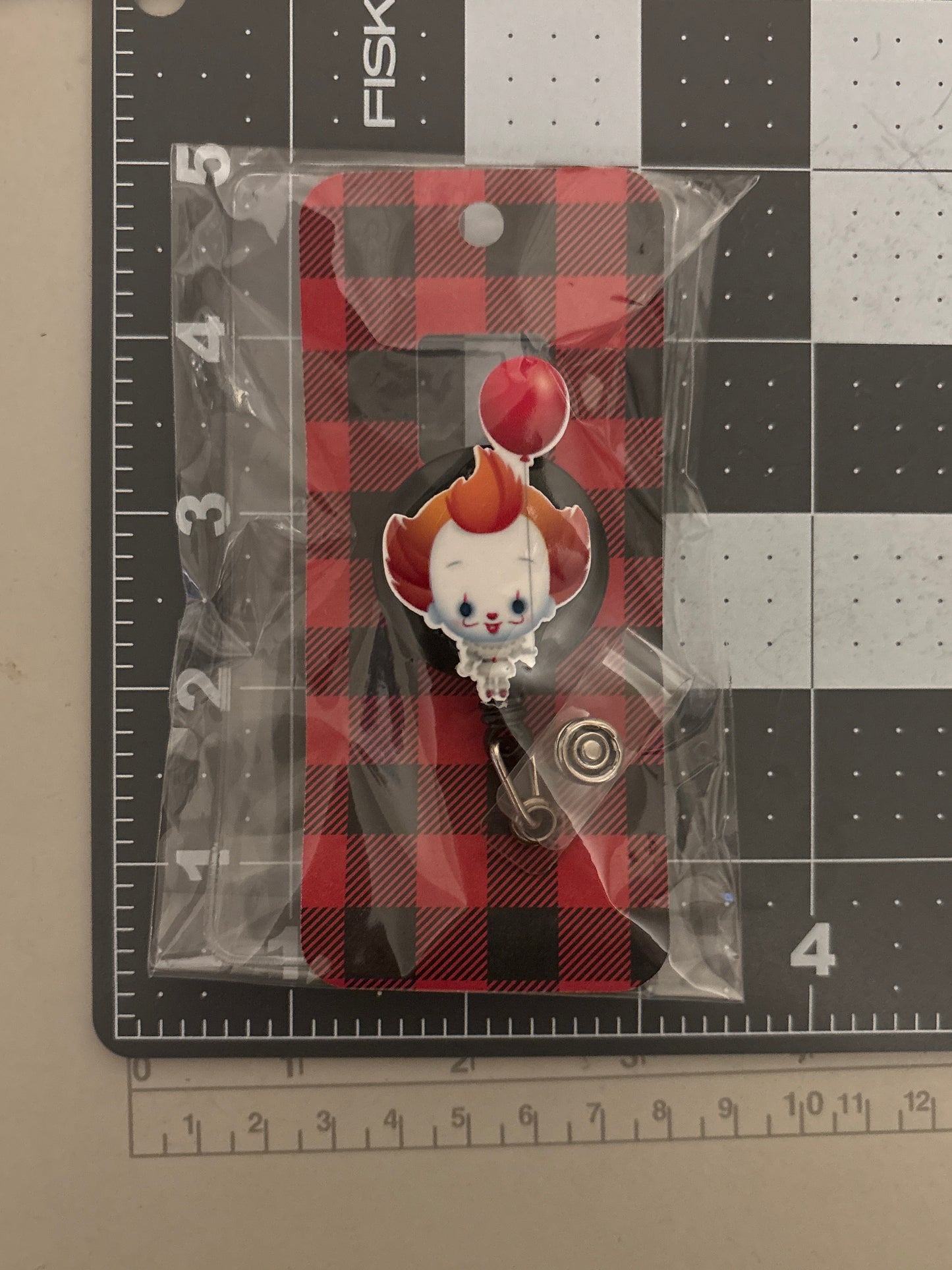 Pennywise Resin Badge Reel